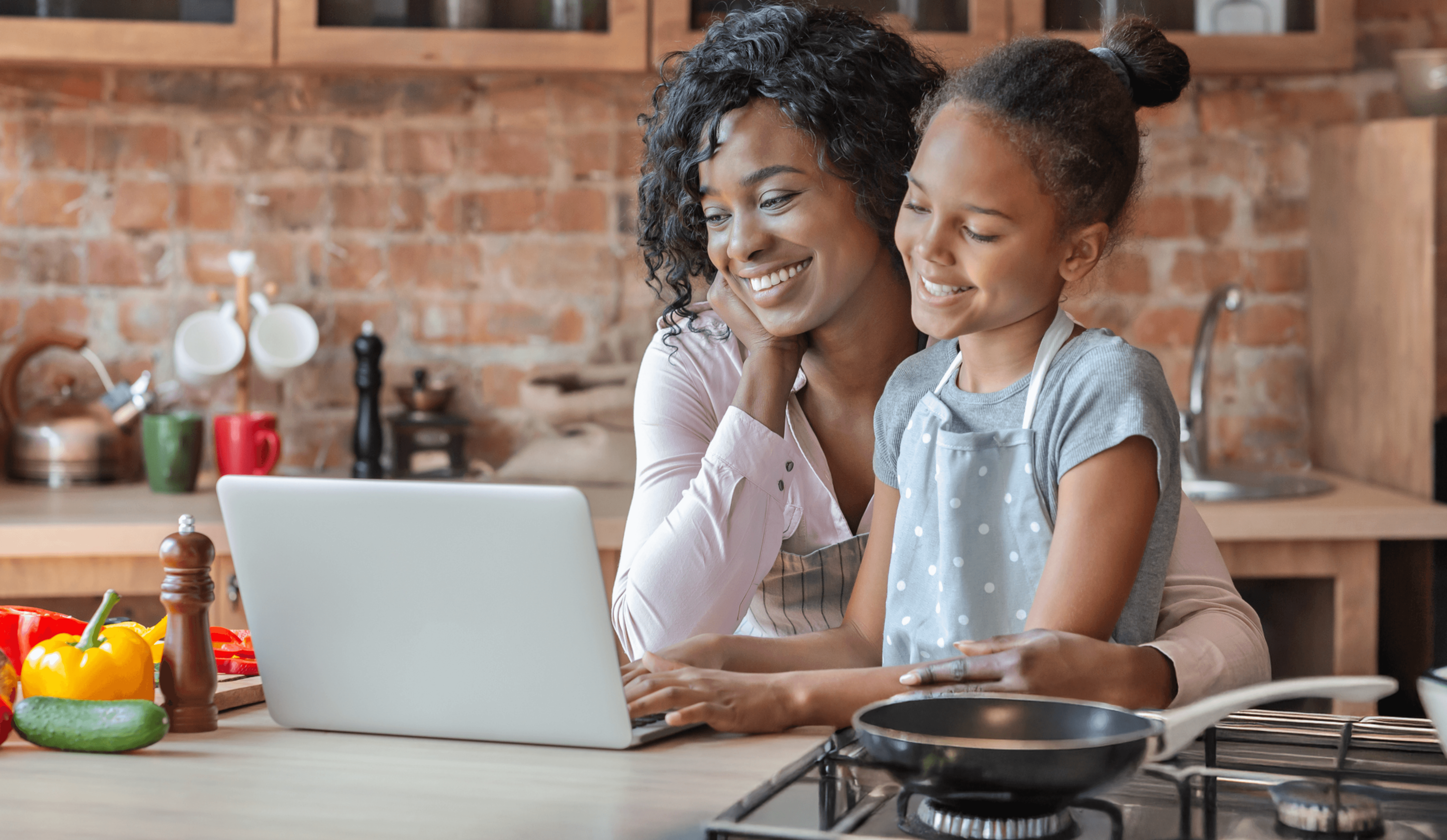 Family cooking on a natural gas cooktop