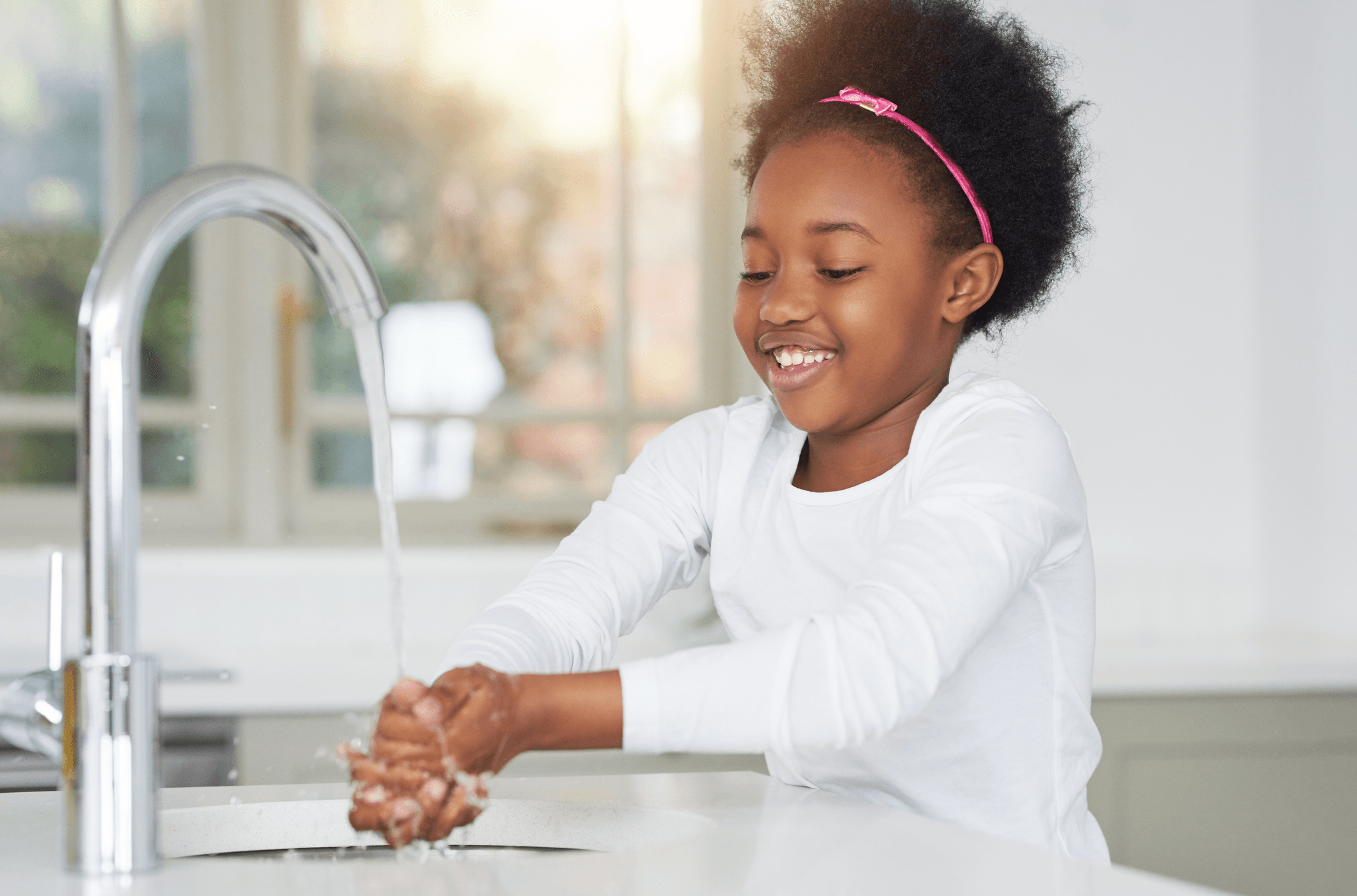 Girl washing hands